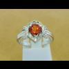 แหวนทองคำขาว Orange Red sapphire ใบเซอร์ฯ  (นน.ทอง 3.9 กรัม เพชร 28P=0.36 กะรัต พลอย 1P=1.34 กะรัต)  ราคา : 23,000 บาท